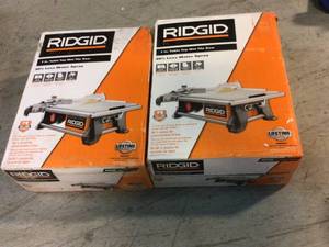 lot 90 image: RIDGID 6.5 Amp Corded 7 in. Table Top Wet Tile Saw Customer Returns See Pictures