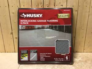 lot 93 image: Husky 18.4 in. x 18.4 in. Gray PVC Garage Flooring Tile (6-Pack) Customer Returns See Pictures