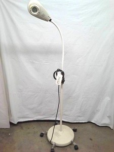 lot 14 image: MSRP $800 Welch Allyn LS-135 Medical Exam Light With Locking Swivel Caster Base - Excellent Condition 1st Pic Is A Stock Photo