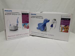 lot 52 image: Philips Respironics InnoSpire Elegance Aerosol Delivery System and Sami the Seal Compressor Nebulizer System