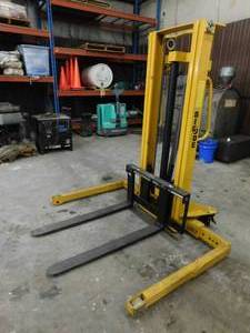 lot 11 image: Big Joe Push Around Manual Lift  Stacker