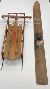 Vintage SkiCraft Olympic water ski and vintage husky runner sled