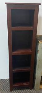 Tall slender wood shelf