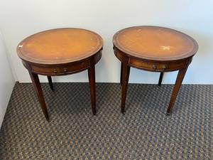 2&nbsp Emperial brand round wood tables with decorative tops and one drawer