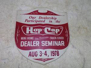 lot 64 image: 1978 Hop Cap Dealer Sign