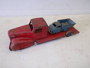 lot 78 image: 2 Early 20th Century Tin Toy Trucks w Wood Wheels