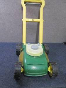 lot 4 image: Toy John Deere Lawn Mower...