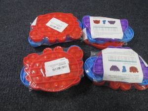 lot 81 image: 4- 3pks PopIt Toys...
