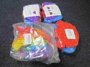 lot 109 image: 4- 3pks PopIt Toys...