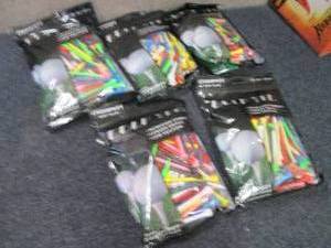lot 131 image: 5 pks Colored Golf Tees...