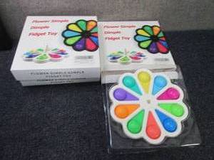 lot 142 image: 3 Flower Dimple Fidget Toys...