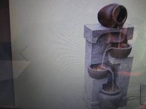 lot 276 image: Teamson Home 4-Tier Stone-Look Sola...
