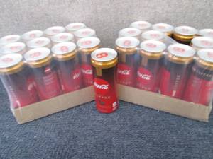 lot 319 image: 2-12 pks Coca Cola Caramel with Cof...