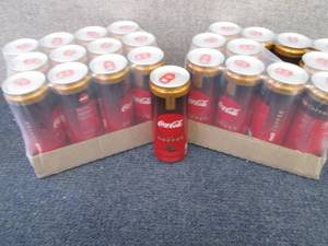 lot 320 image: 2-12 pks Coca Cola Caramel with Cof...