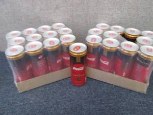 lot 324 image: 2-12 pks Coca Cola Caramel with Cof...