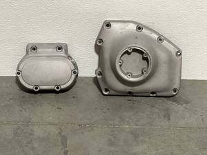 lot 12 image: Harley Davidson Cam Cover and Trans Plate