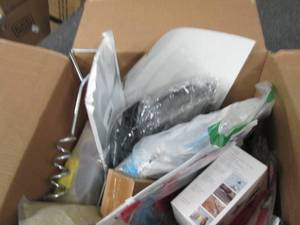 box of ground anchors and other mis...