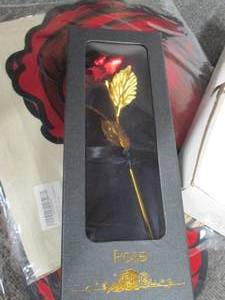 box of fake metal rose, shower shel...