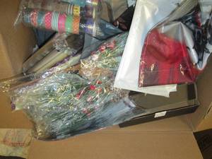 box of hot glue guns and crafting s...