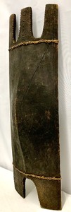 lot 12 image: Large Carved Convex Tribal Wood Shield Papua New Guinea- 33 Inches Tall