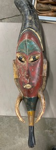 lot 30 image: Tall Carved Red African Guro Mask #1