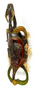 lot 33 image: Vintage Tall Carved African Guro Mask w Ram On Top and Ornate Chin Carving