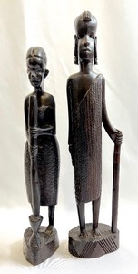 lot 56 image: A Pair of Ebony-Toned Carved Tanzanian Tribal Figures
