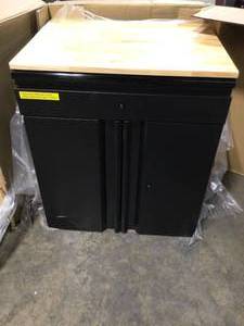 Heavy Duty Welded 20-Gauge Steel 1-Drawer 2-Door Garage Base Cabinet in Black (28 in. W x 32 in. H x 21.5 in. D) by Husky Customer Returns See Pictures