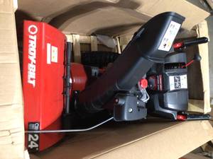 Storm 24 in. 208 cc Two- Stage Gas Snow Blower with Electric Start Self Propelled by Troy-Bilt Customer Returns See Pictures