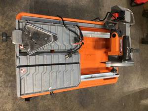 9 Amp Corded 7 in. Wet Tile Saw with Stand by RIDGID Customer Returns See Pictures