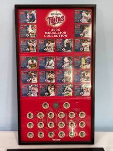 lot 44 image: Minnesota Twins 2005 Medallion Collection and Framed Ticket Stubs
