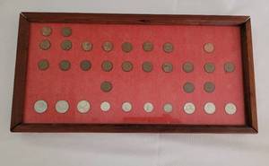 lot 180 image: Framed Canadian Coin Set Plus Stamp Books and Stamp Guide