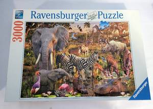 lot 197 image: Four Desirable Ravensburger Puzzles