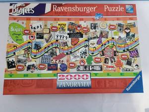 lot 313 image: Selection of Four Unique Puzzles, Including The Beatles & Disney Collage