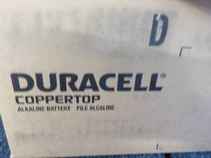 lot 210 image: Case of 112 Duracell Copper Top siz...