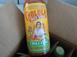 lot 284 image: Case of 12 Cholula Hot Sauce...