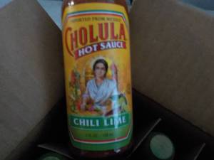 lot 285 image: Case of 12 Cholula Hot Sauce...