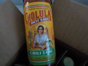 lot 287 image: Case of 12 Cholula Hot Sauce...