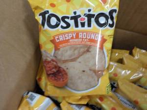 lot 375 image: Case of Tostitos Crispy Rounds...