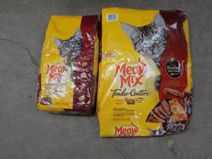 lot 73 image: 2 Bags Meow Mix Cat Food...