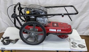 lot 27 image: TORO 22 in. 163cc Walk Behind String Mower, Cutting Swath with 4-Cycle Briggs and Stratton Engine