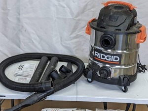 lot 173 image: RIDGID 10 Gal. 6.0-Peak HP Stainless Steel WetDry Shop Vacuum with Filter, Hose and Accessories