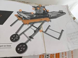 lot 25 image: RIDGID 10 in. Wet Tile Saw with Stand