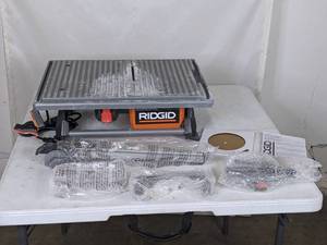 lot 241 image: RIDGID 6.5 Amp Corded 7 in. Table Top Wet Tile Saw