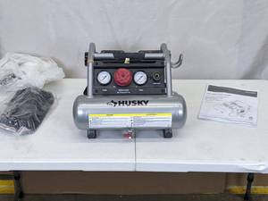 lot 234 image: Husky 1 Gal. Portable Electric-Powered Silent Air Compressor