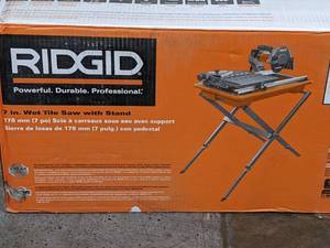 lot 298 image: RIDGID 9 Amp Corded 7 in. Wet Tile Saw with Stand