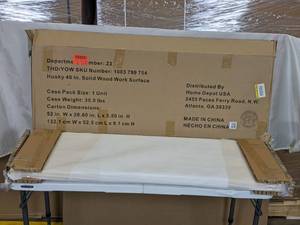 lot 304 image: Husky 48 in. Solid Wood Work Surface for Regular Duty Welded Steel Garage Storage System