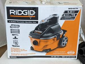 lot 306 image: RIDGID 4 Gallon 5.0-Peak HP Portable WetDry Shop Vacuum with Fine Dust Filter, Hose and Accessories