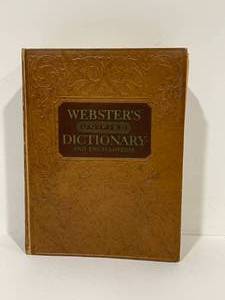 lot 22 image: Antique Websters Dictionary and Encyclopedia