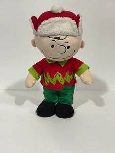 lot 1 image: Charlie Brown Plush Holiday Greeter